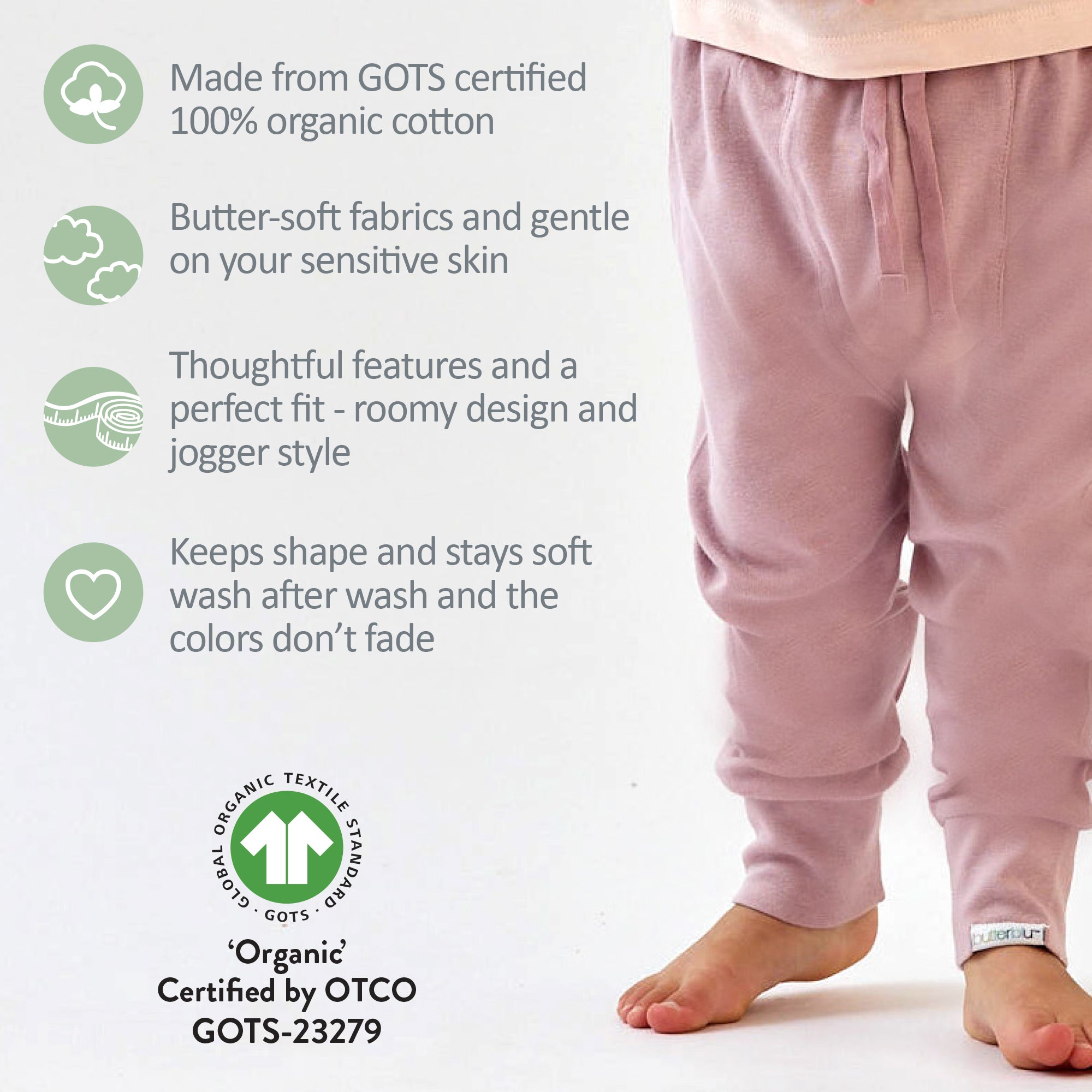 Pink pajama pants with GOTS certified organic cotton information on a white background