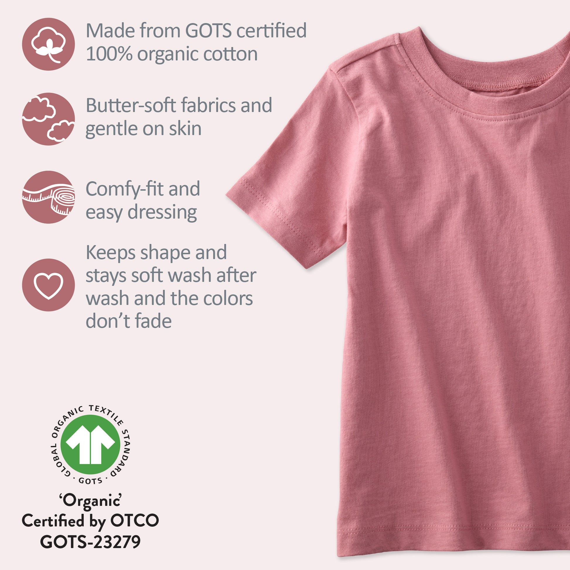 Pink t-shirt with organic cotton certification details on a light gray background