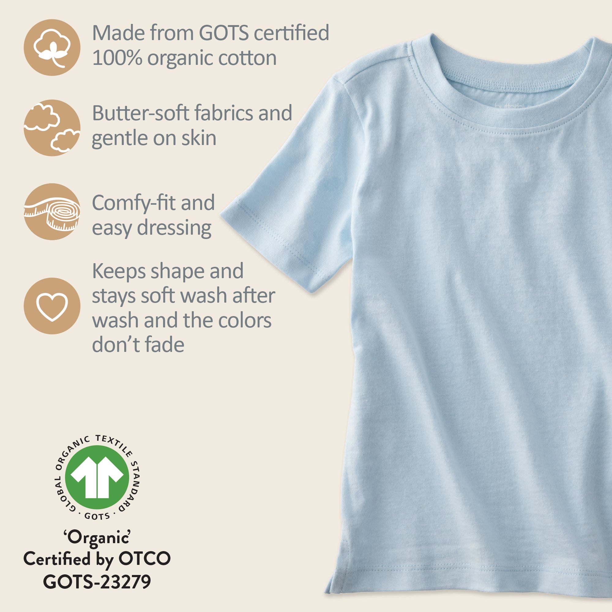 Light blue t-shirt with organic cotton certification details on a beige background